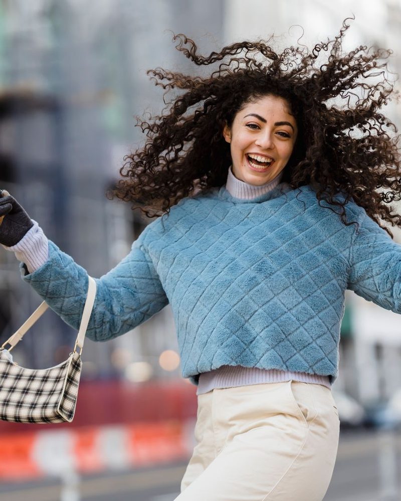 Customer leaving a retail partner store satisfied