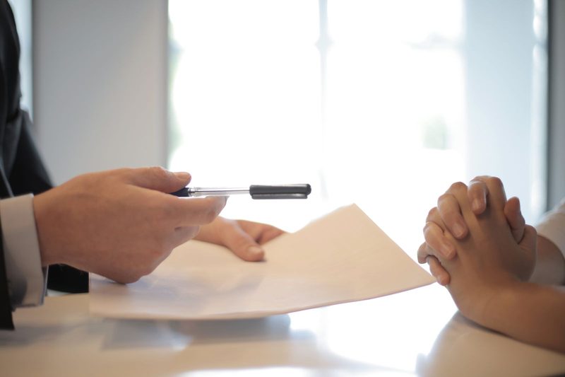 New team member completing W-2 employment paperwork