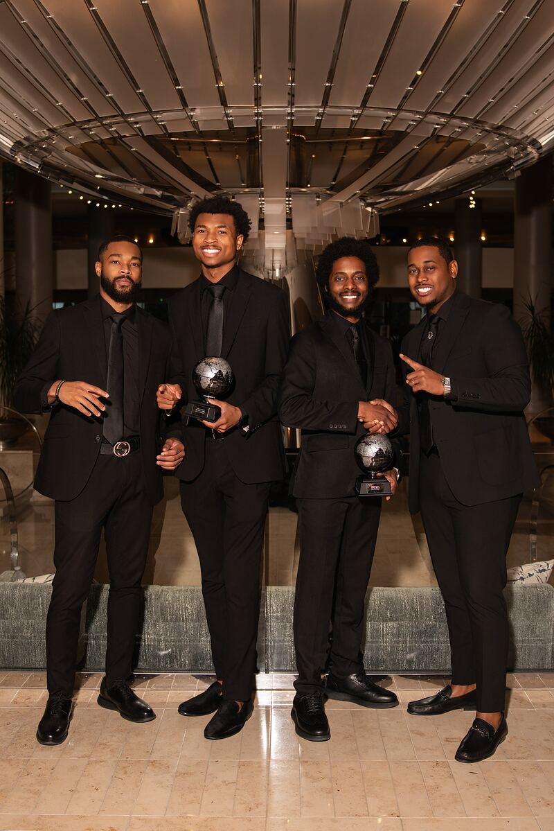 O.W.E Team members recognized for campaign performance at a client awards event